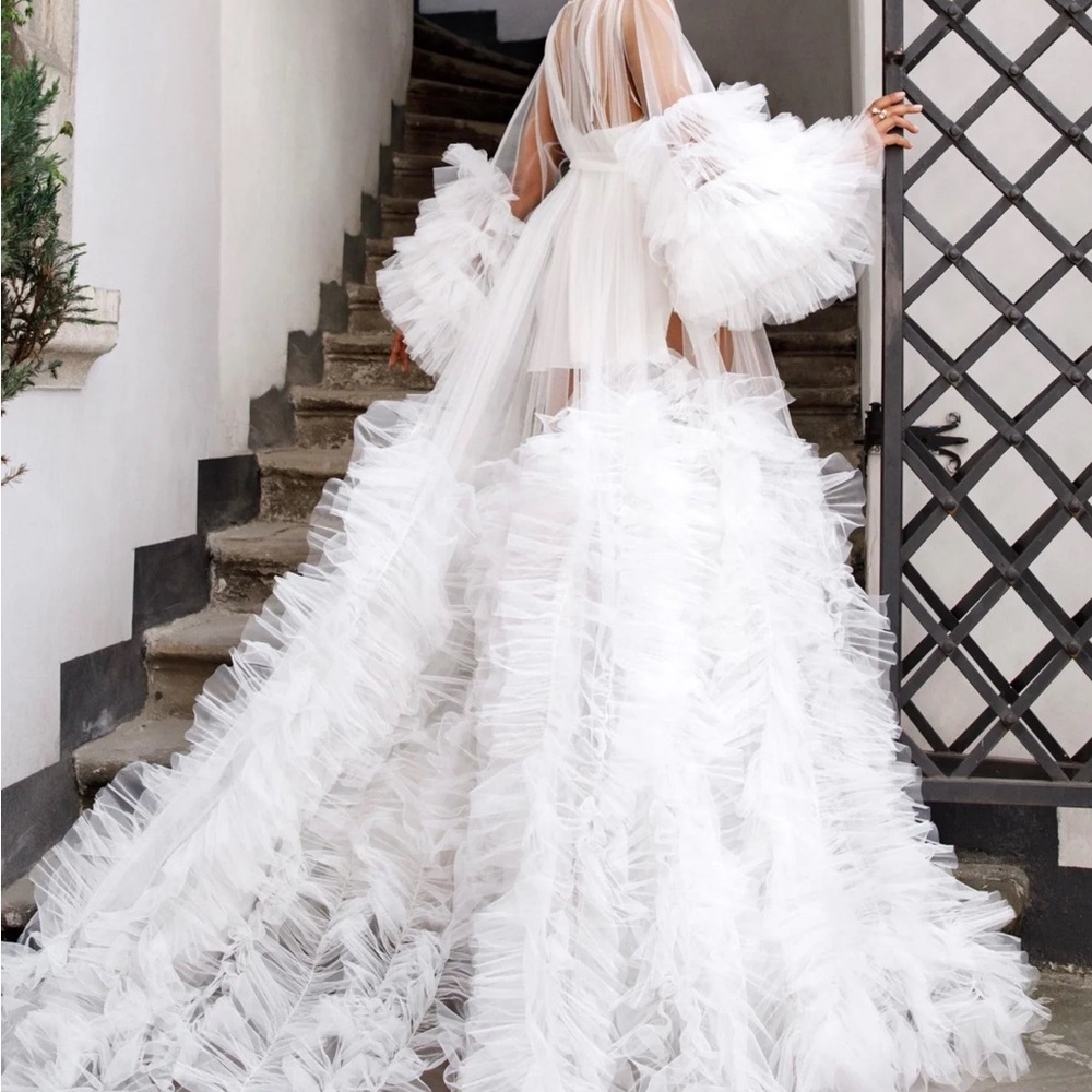 Elegant White Ruffled Gown